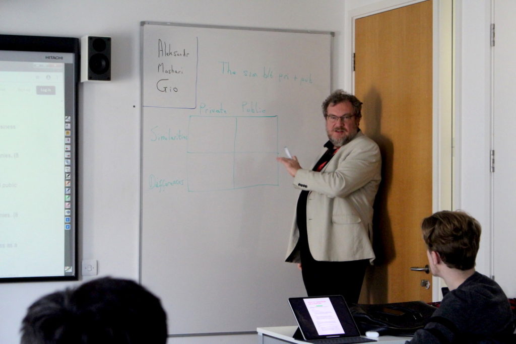 Deputy Programme Manager of International Foundation, John, teaching using a whiteboard