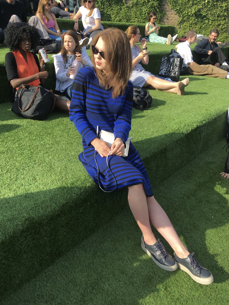 INTO Alumni and UK graduate Polina sitting on campus